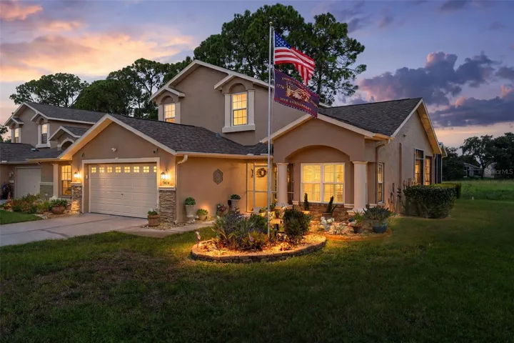 Welcome Home! Beautiful End Villa with Two-Car Garage & Charming Covered Entry
