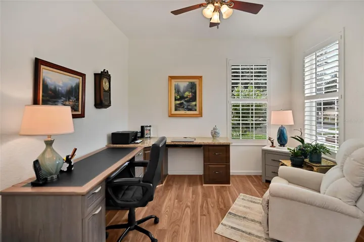 Flex Room off foyer with French doors, built-in desk and plantation shutters