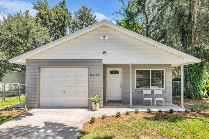 Great curb appeal, front porch and attached one car garage!