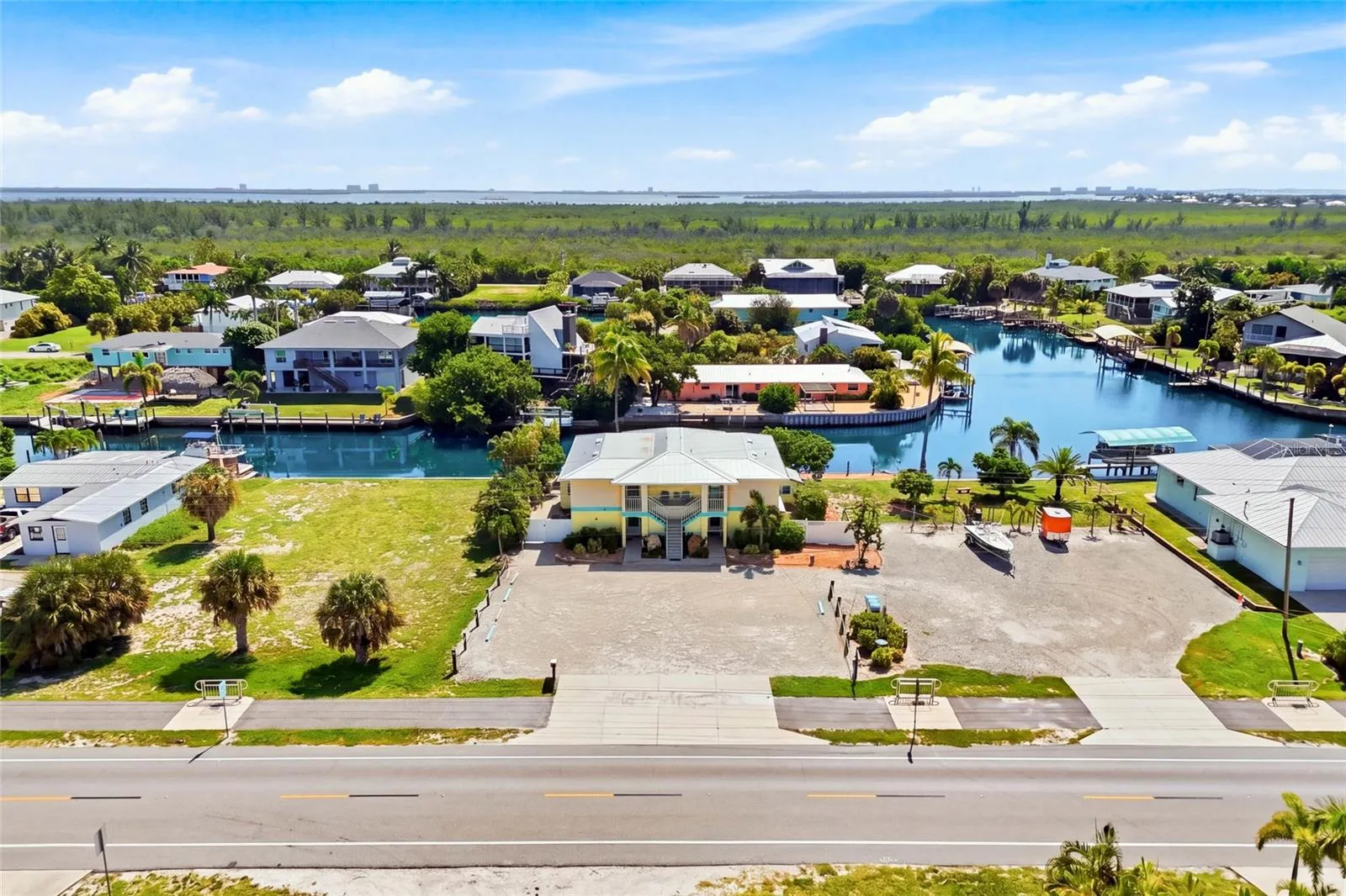 Welcome to Golden Palms Resort, a beautifully updated eight-unit waterfront retreat offering the perfect combination of investment opportunity and laid-back Pine Island living.