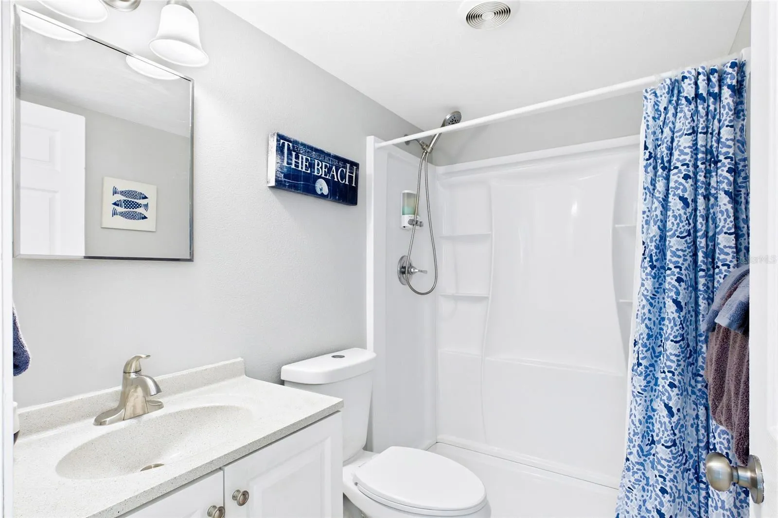 THE BEACH ROOM Each unit includes its own private bathroom, adding convenience and privacy for both short-term vacation guests and longer-term residents.