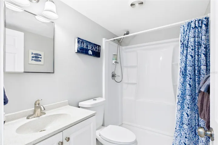 THE BEACH ROOM Each unit includes its own private bathroom, adding convenience and privacy for both short-term vacation guests and longer-term residents.