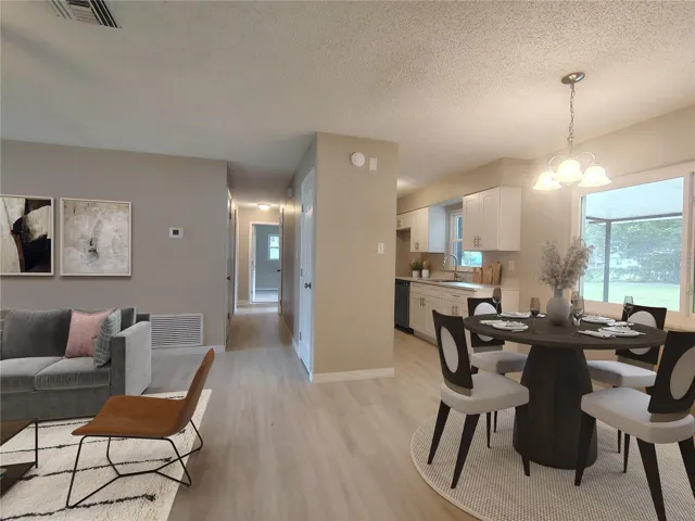 Virtually Staged - Dining Area to Kitchen