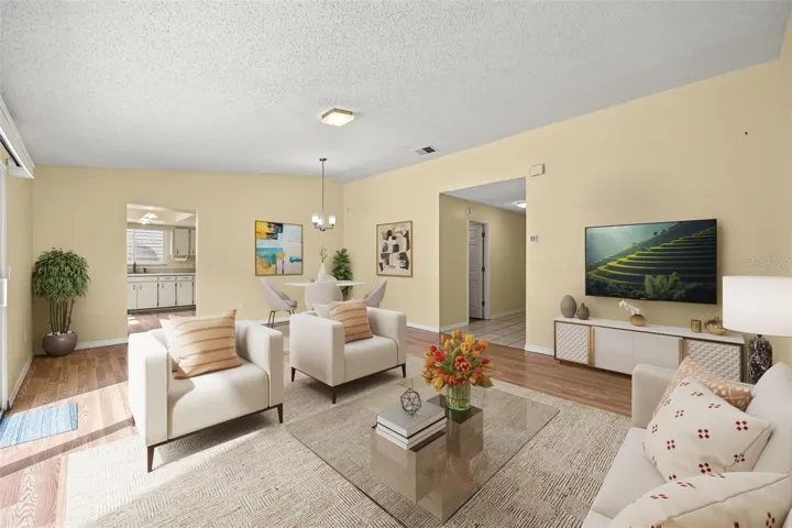 Virtually staged Dining and Living Room area right off the kitchen