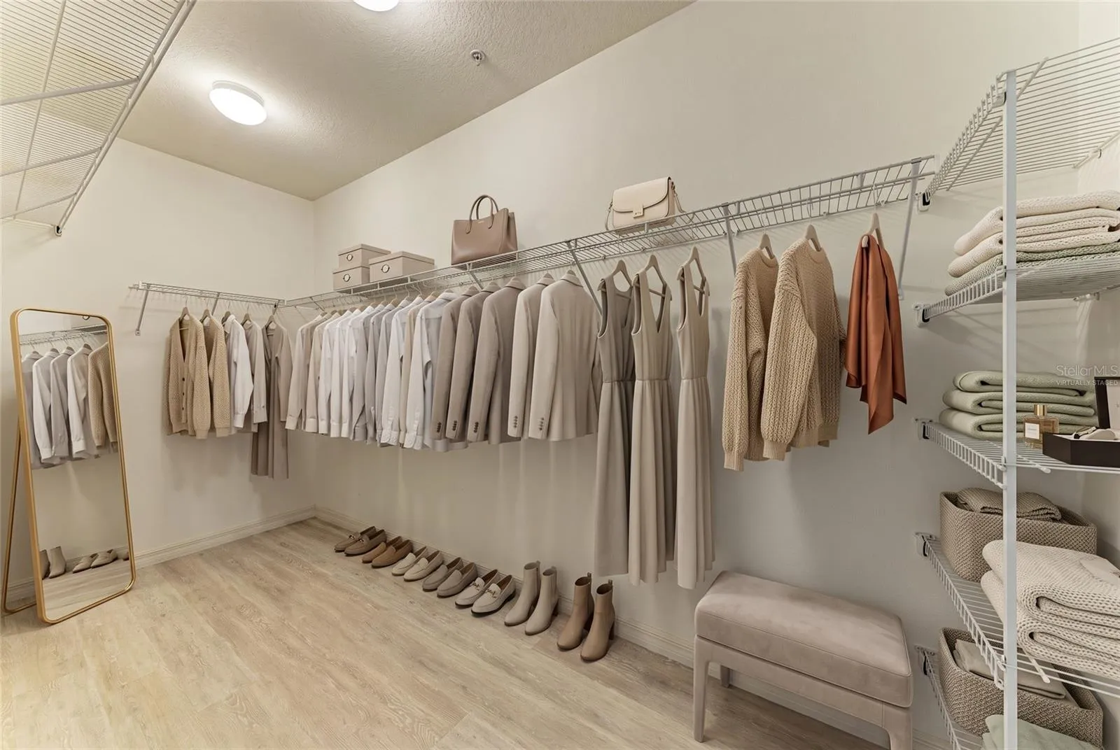 Primary Walk-in Closet  virtually staged