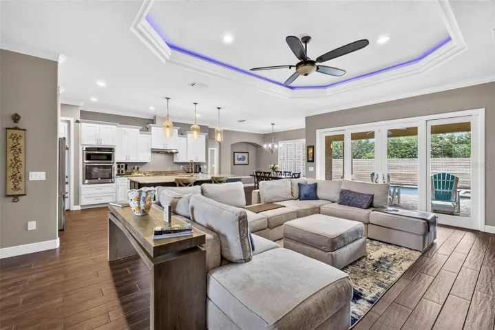 Living room with view of kitchen