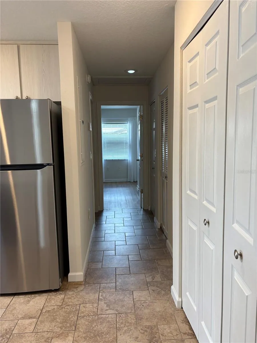 Kitchen hallway to guest bedroom