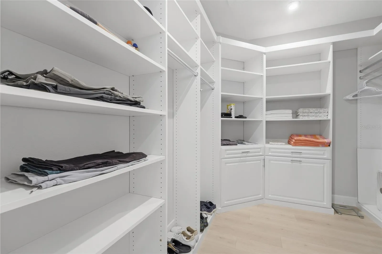 Oversized M/B walk-in closet custom built- in shelving