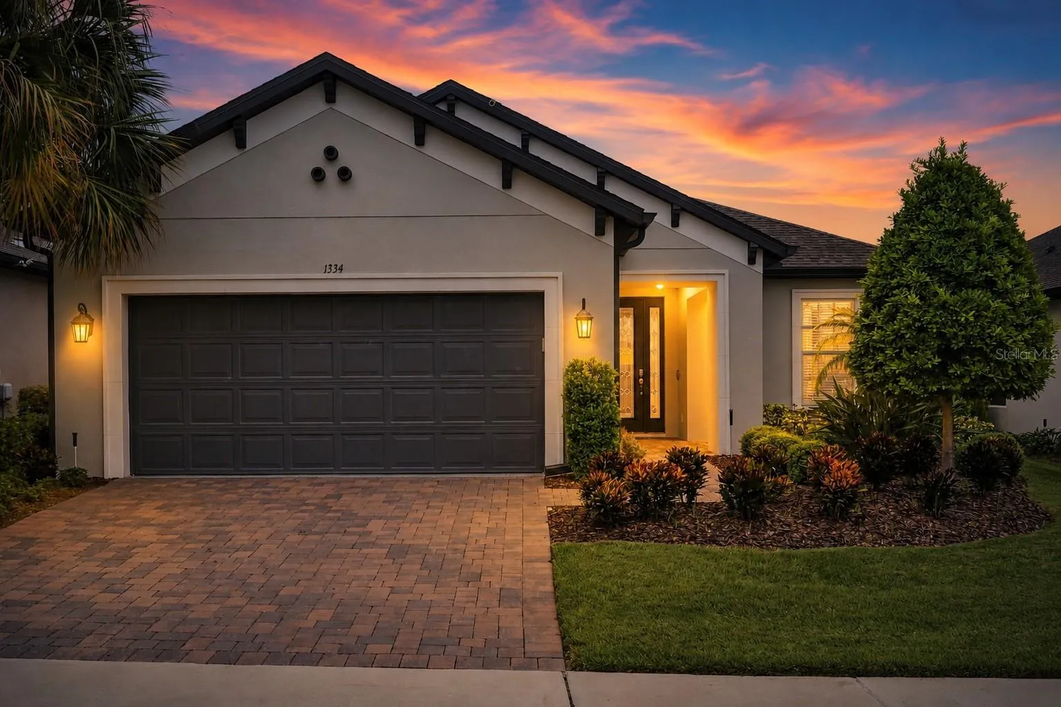 Front of home in well-kept 55+ Highland Ranch