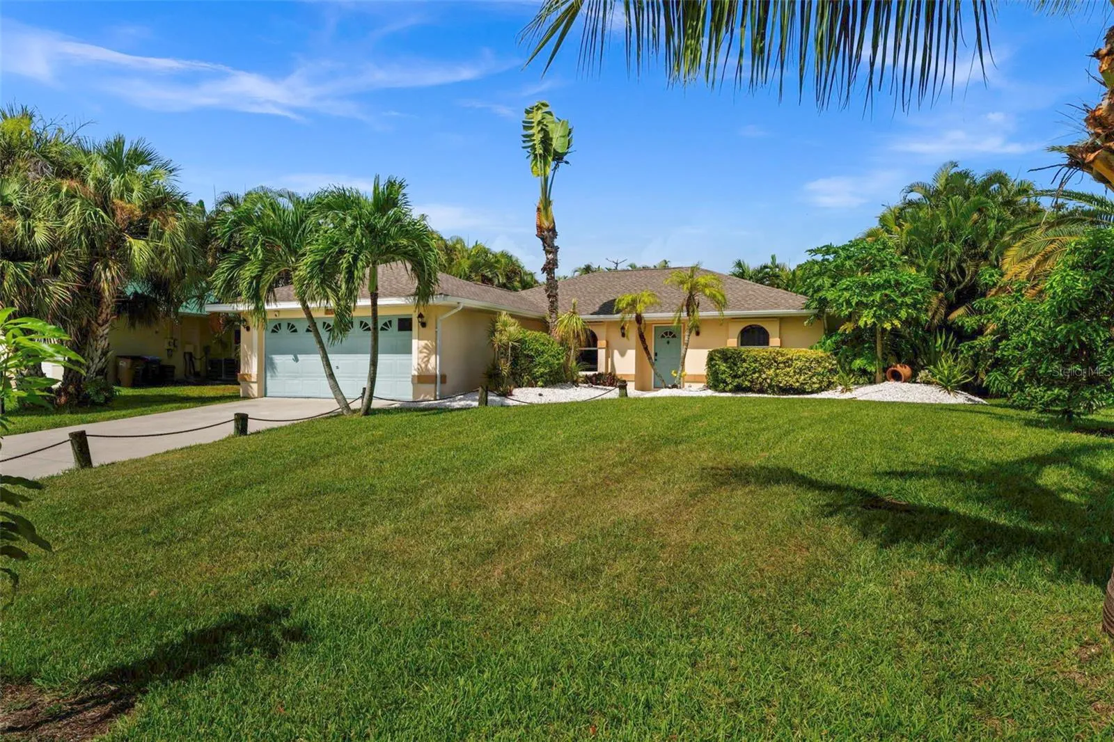 Mature landscaping and a welcoming front