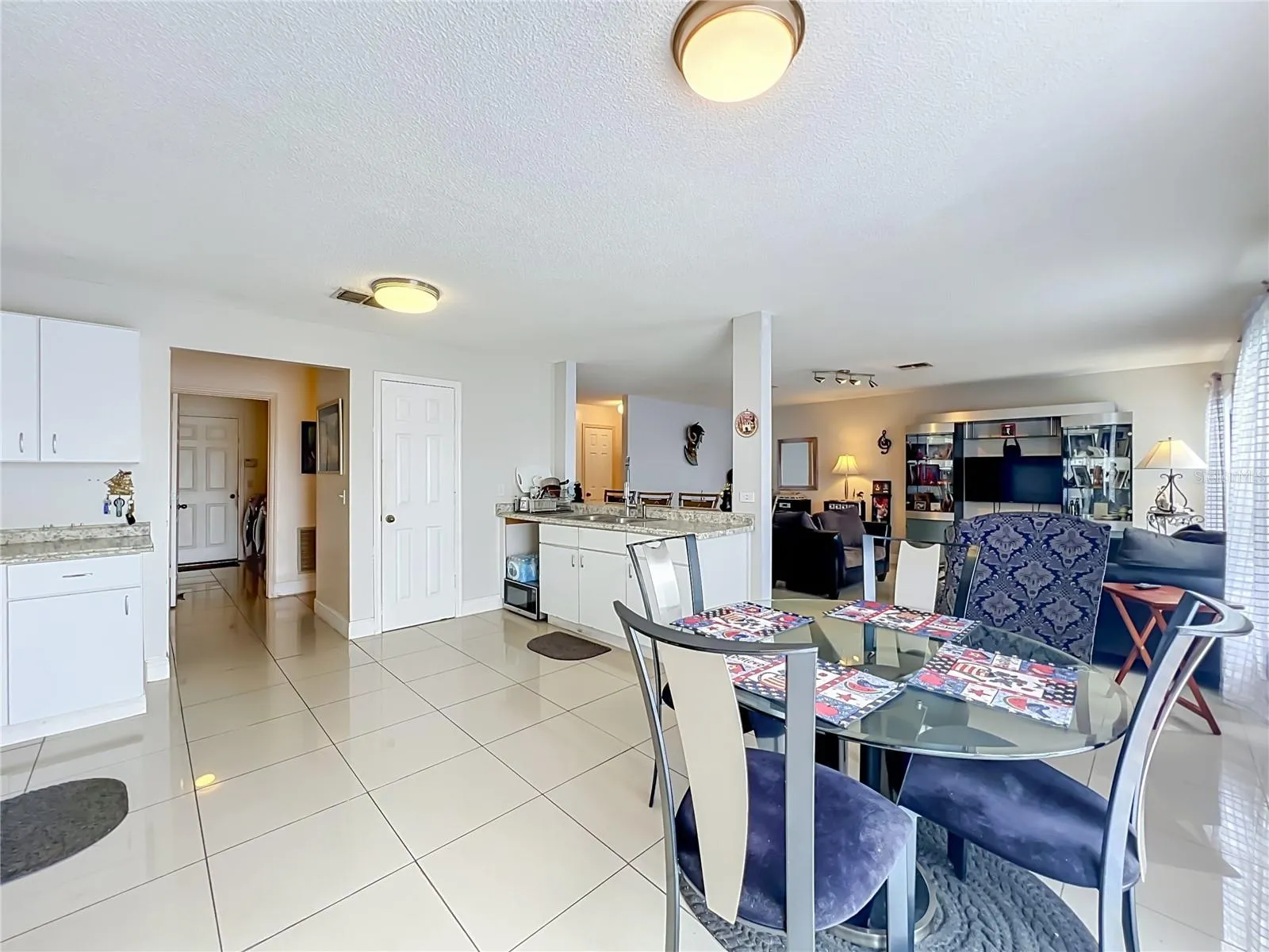 Dinette area inside large kitchen open to family room