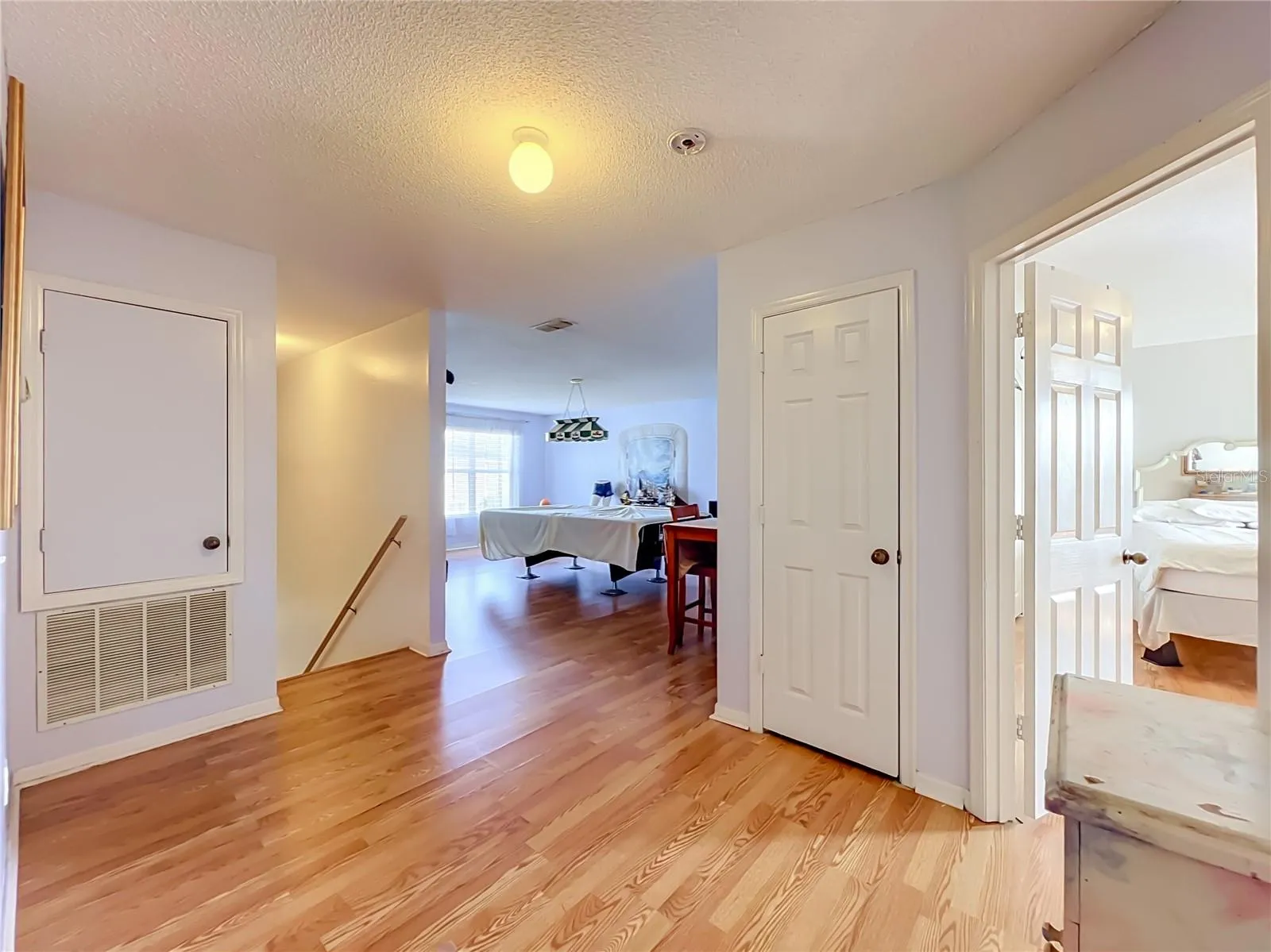 Wood laminate floors at landing on 2nd floor