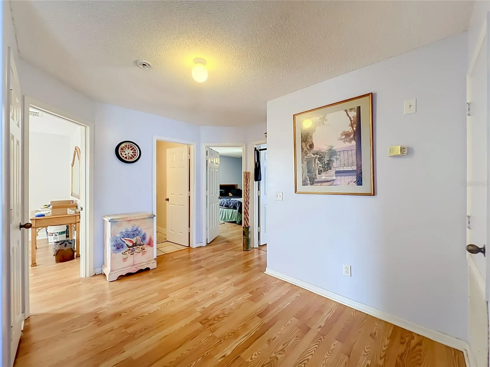 Beautiful wood laminate floors lead to 3 bedrooms on 2nd floor