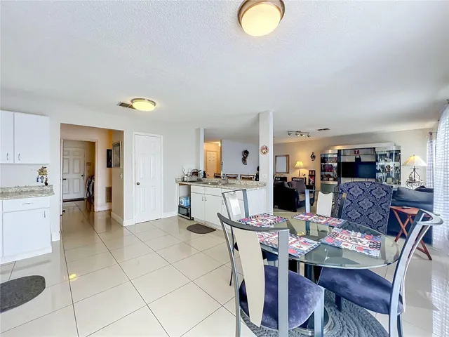 Dinette area inside large kitchen open to family room