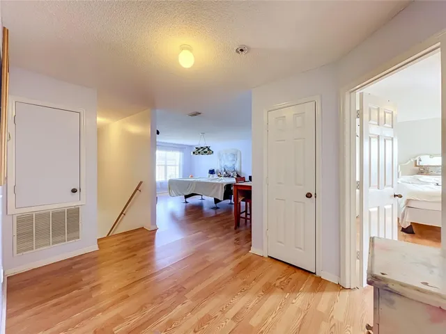 Wood laminate floors at landing on 2nd floor