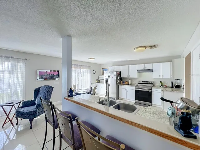 Kitchen is open to the family room