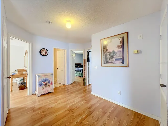 Beautiful wood laminate floors lead to 3 bedrooms on 2nd floor
