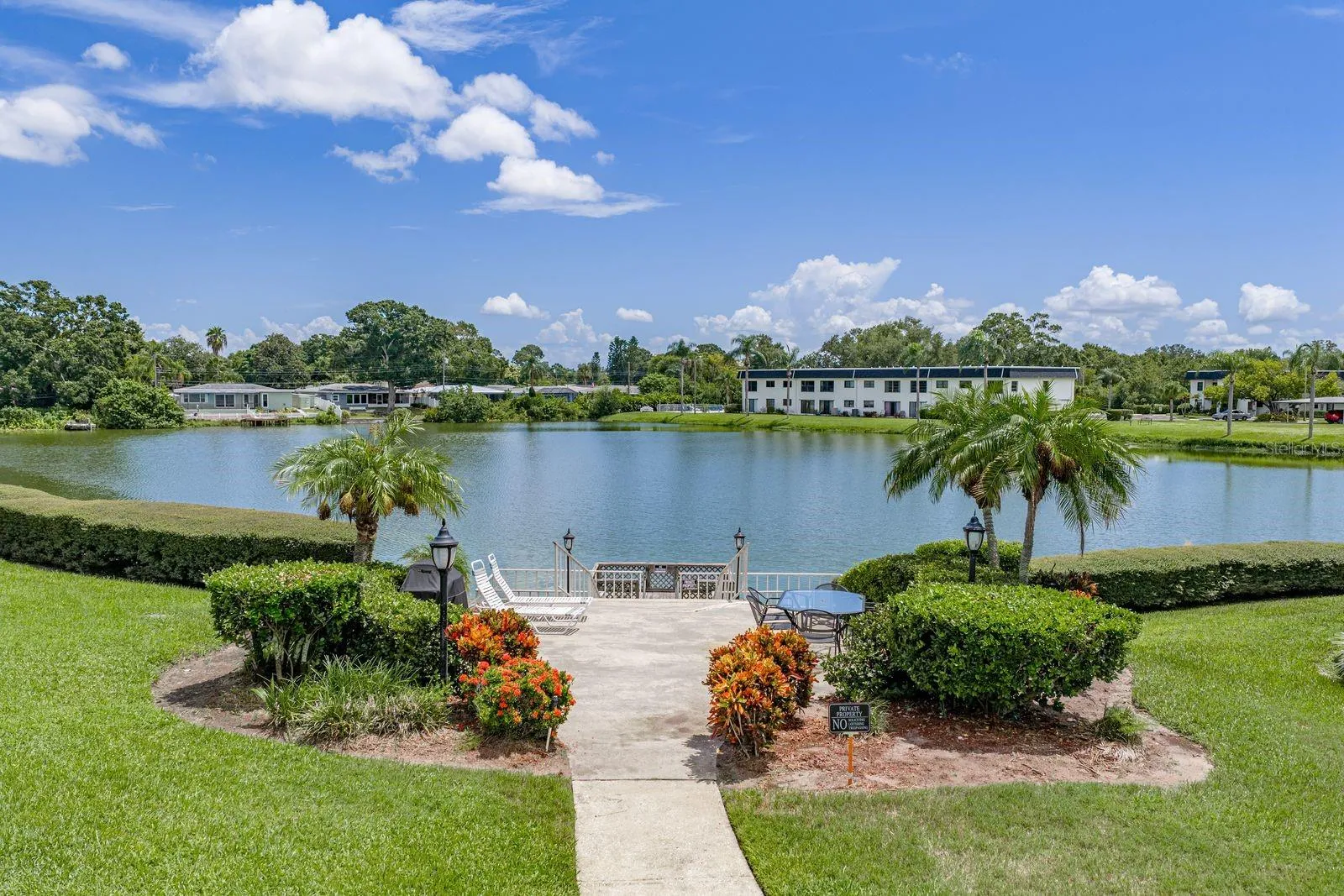 Beautiful landscape. This is steps from your door with sitting , BBQ and dock.