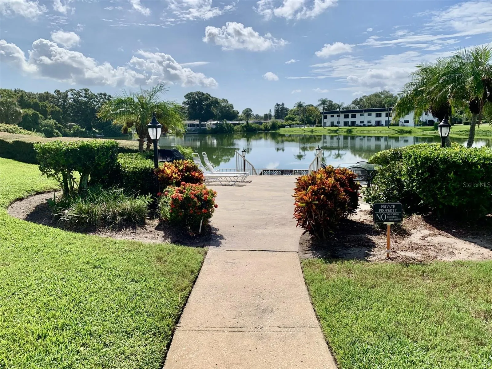 BBQ area and dock on pond