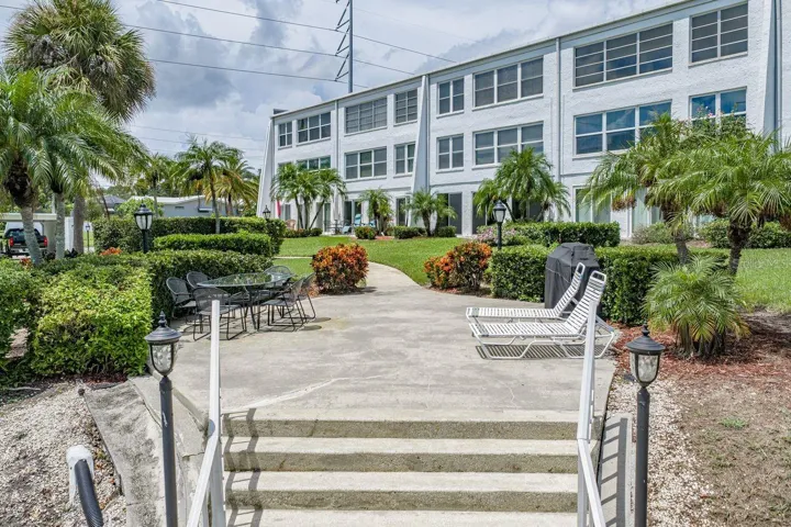 Your condo is a short few steps to a community sitting, BBQ and fishing dock