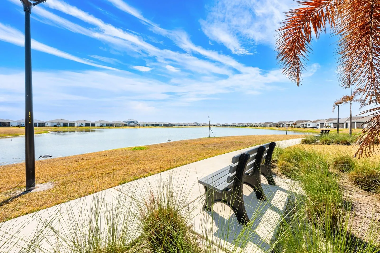 Relax with a view of the community lake