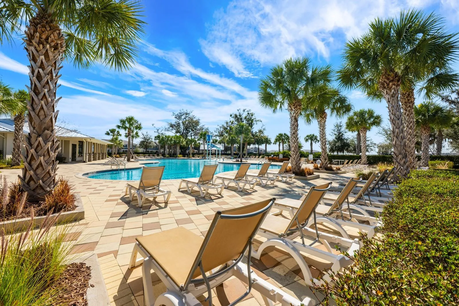 Enjoy free time poolside in a lounge chair