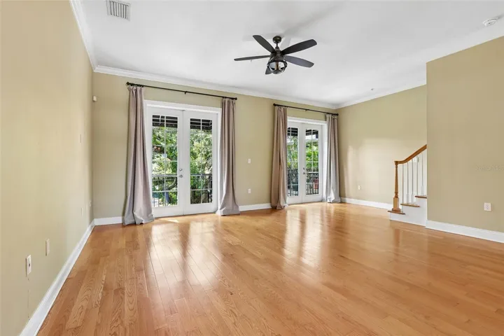 Living room towards Moody courtyard balcony