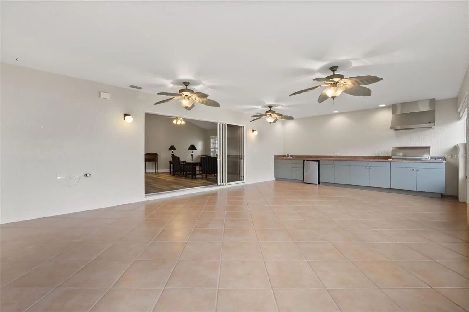 Enclose Lanai with summer kitchen