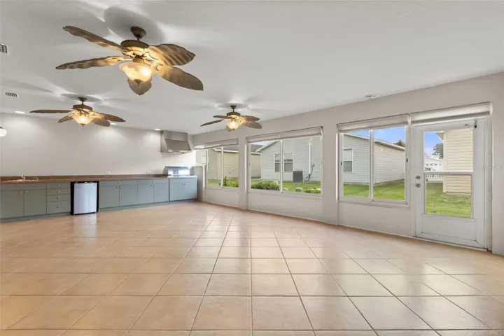 Enclose Lanai with summer kitchen