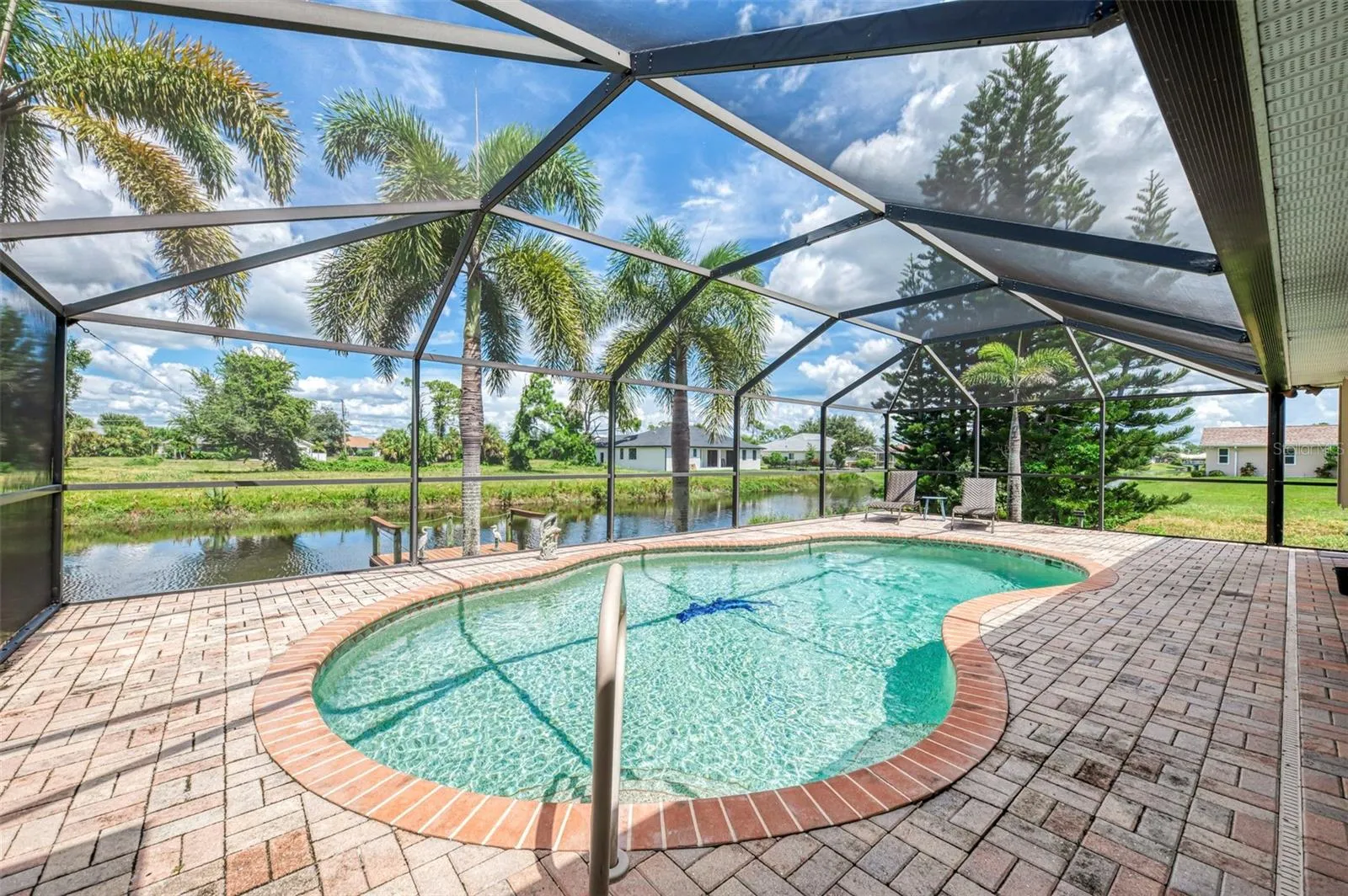 Pool with large paved area