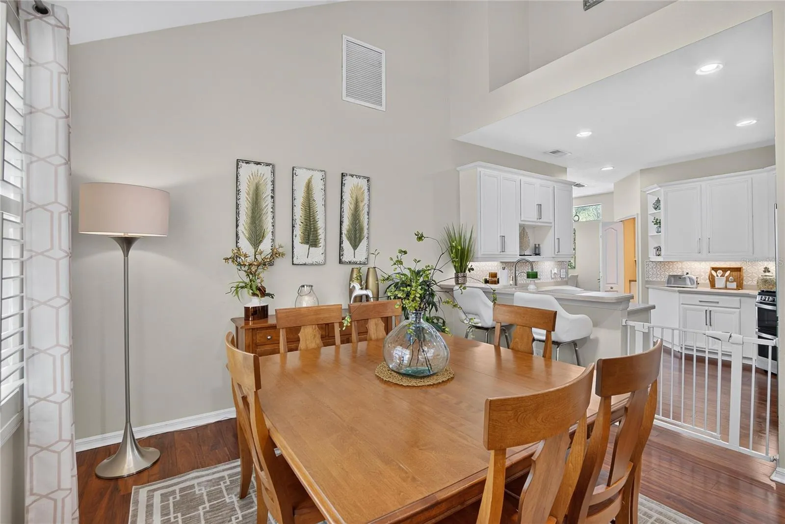 Dining area flows seamlessly into the kitchen and breakfast bar