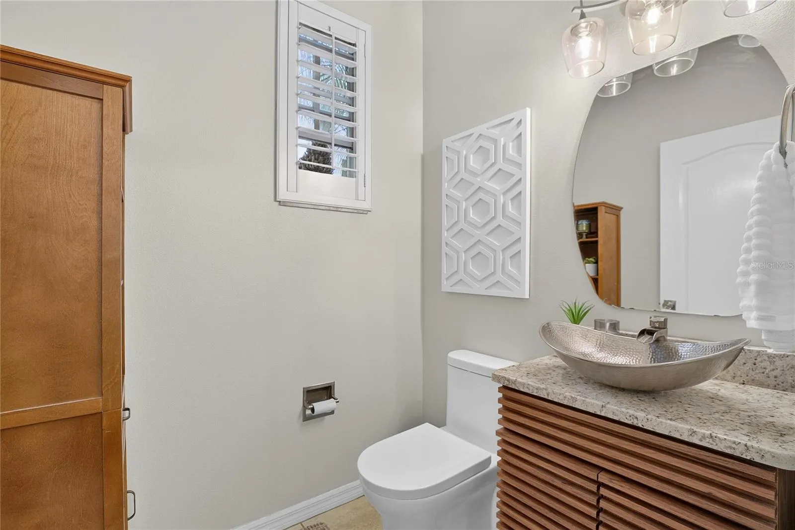 Convenient half bath located just off the entry.