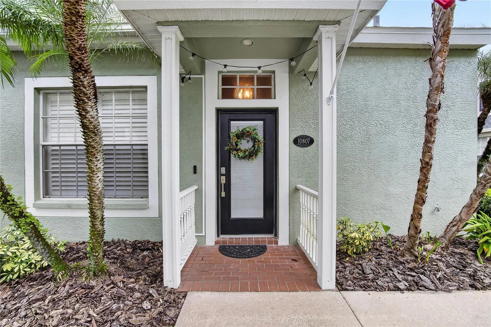 Charming covered front entry welcomes you home.