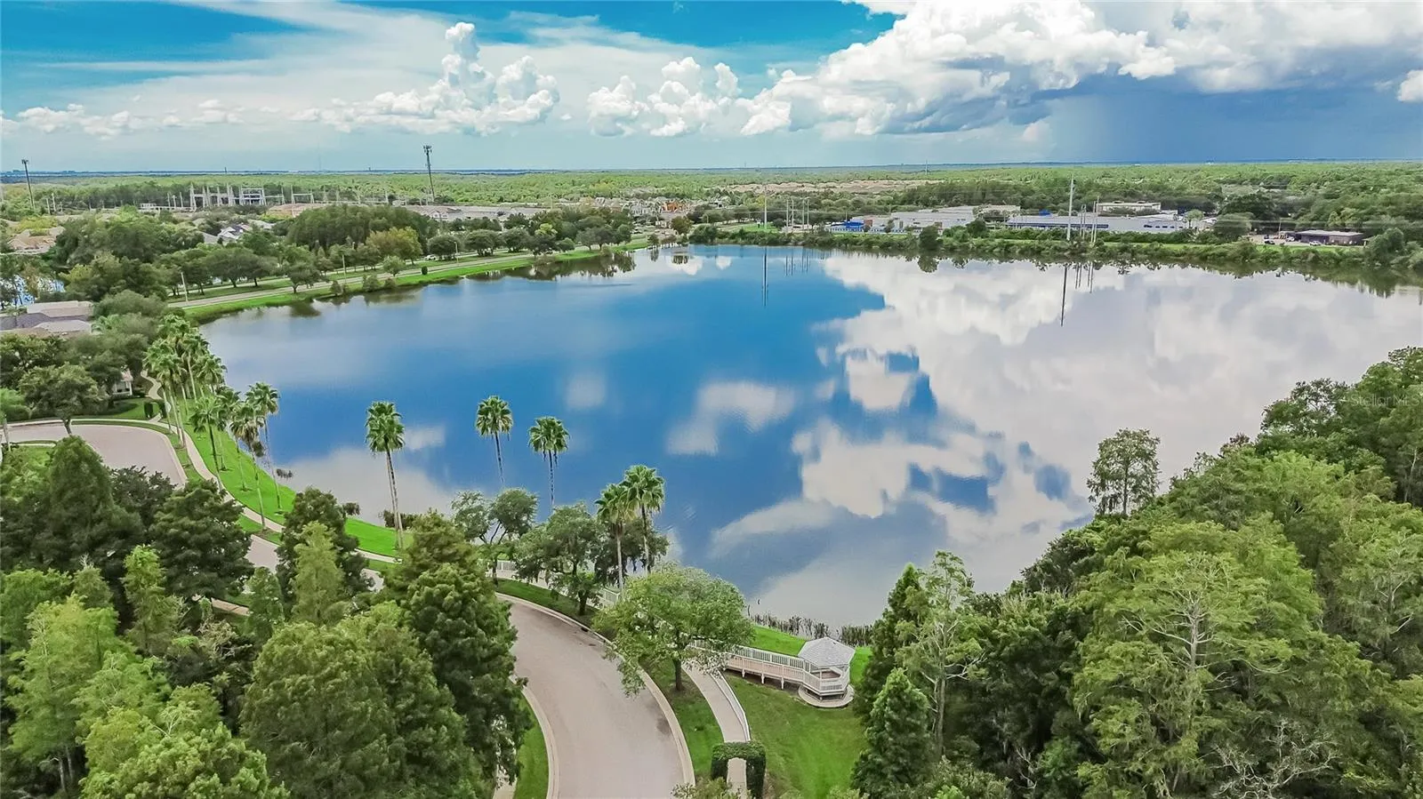 Beautiful community lake and lush surroundings add to The Vineyards’ inviting setting.