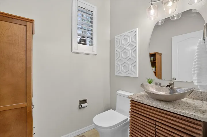 Convenient half bath located just off the entry.