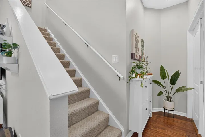 Stairway leads to the second floor featuring a spacious loft, two additional bedrooms and full bath