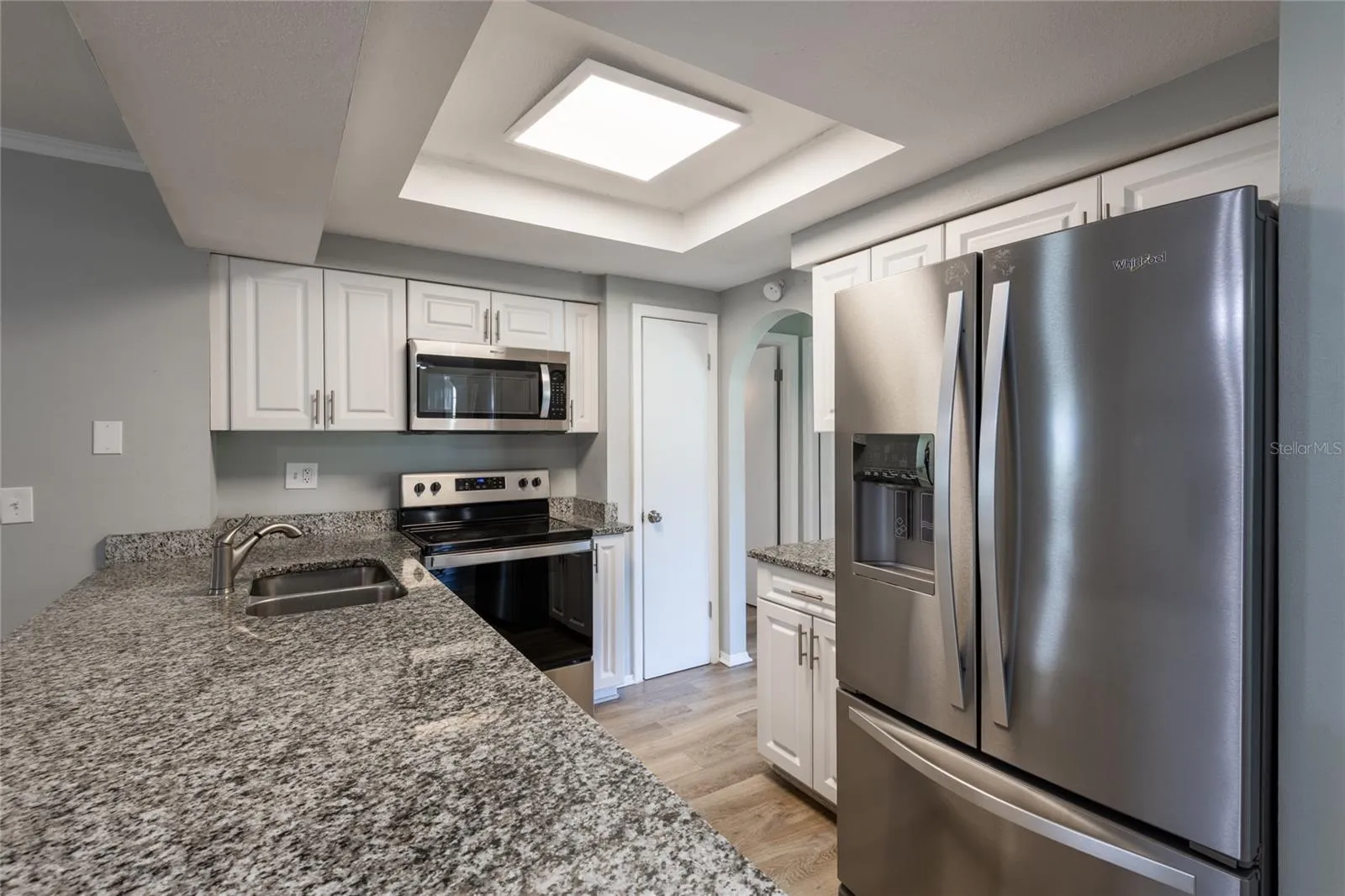 Shaker cabinets with granite counter tops. Newer appliances.