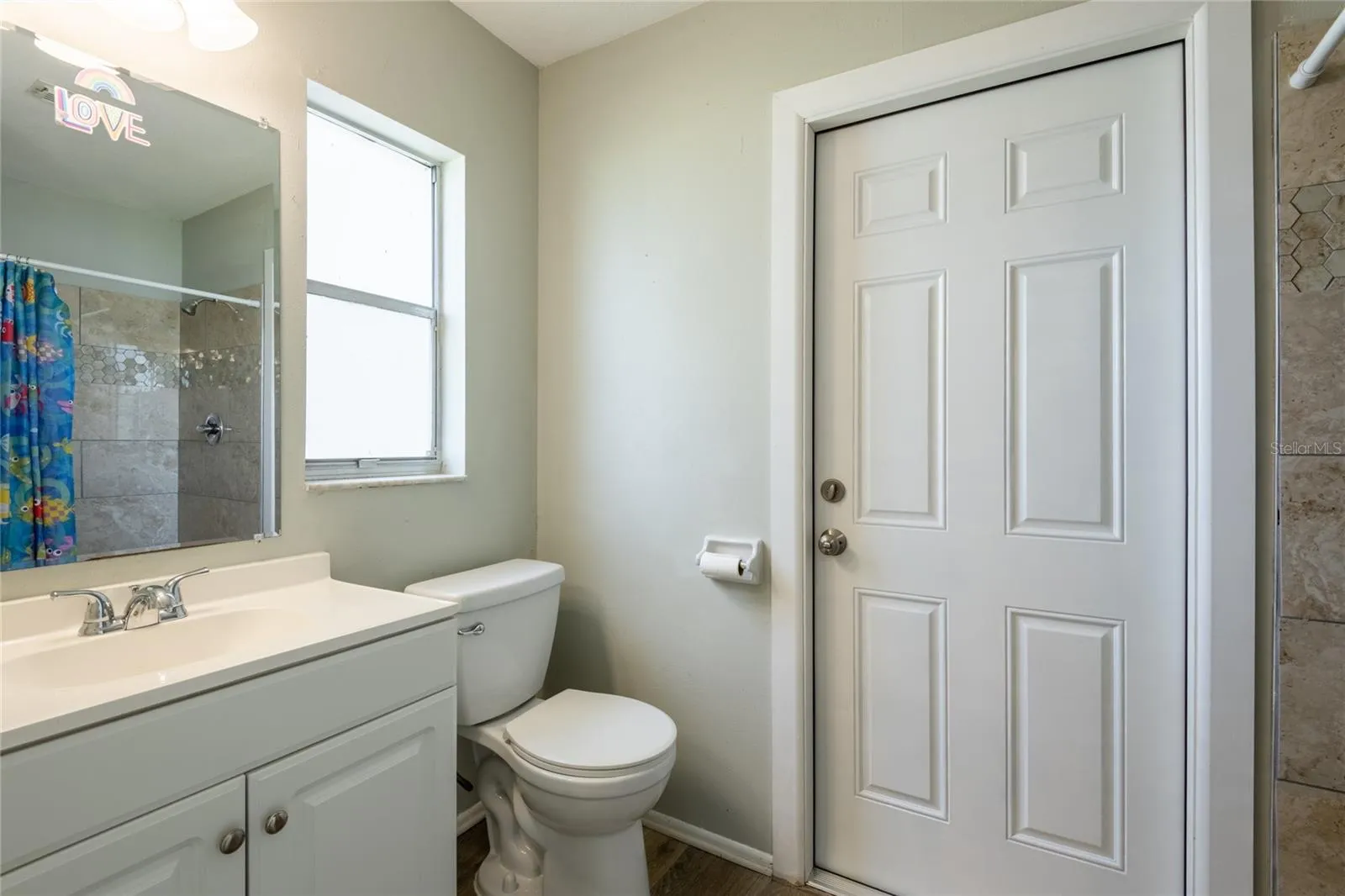 2nd bathroom with standup shower.