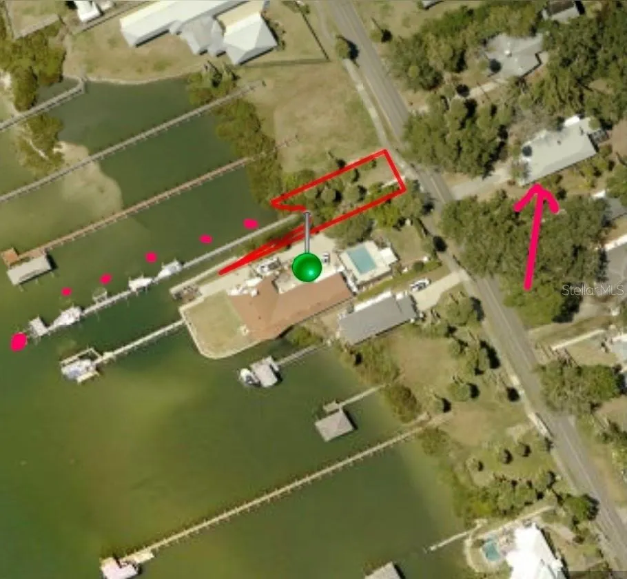 Eagle view house and pier parcel with end slip.
