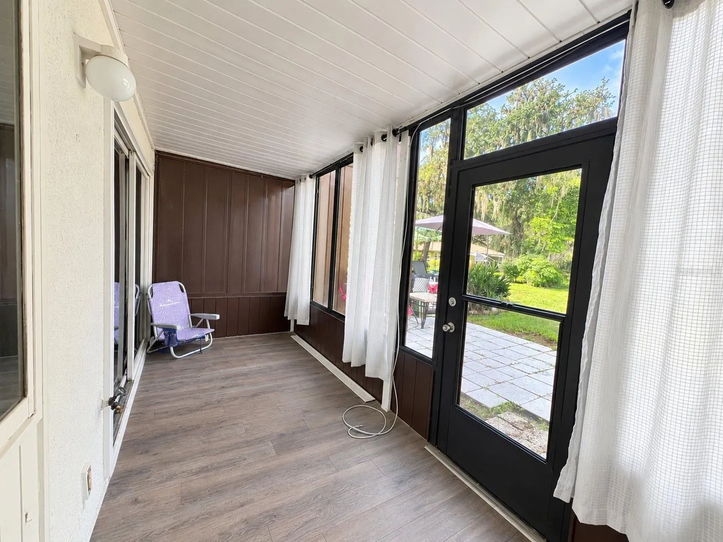 inside patio with storage closet