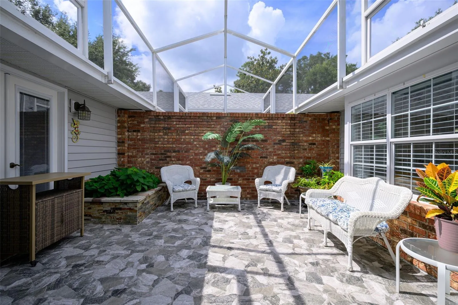Courtyard w/Cathedral Bird cage lanai
