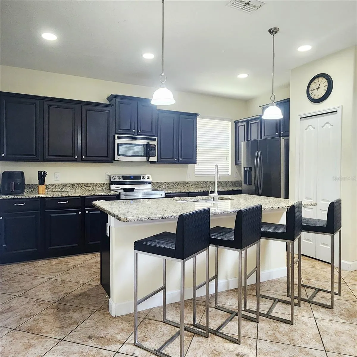 Kitchen is open to the family room.
