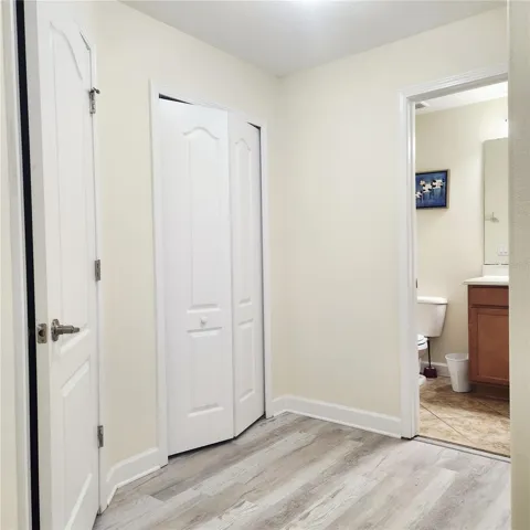 Upstairs hallway leading to the bathroom