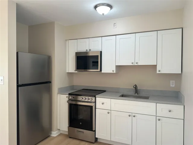 Updated Kitchen Appliances &amp; Cabinetry