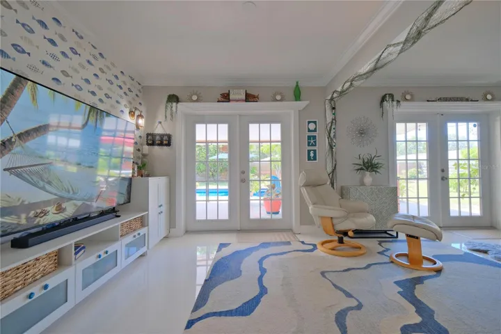 Living Room TV Wall and Patio French Doors