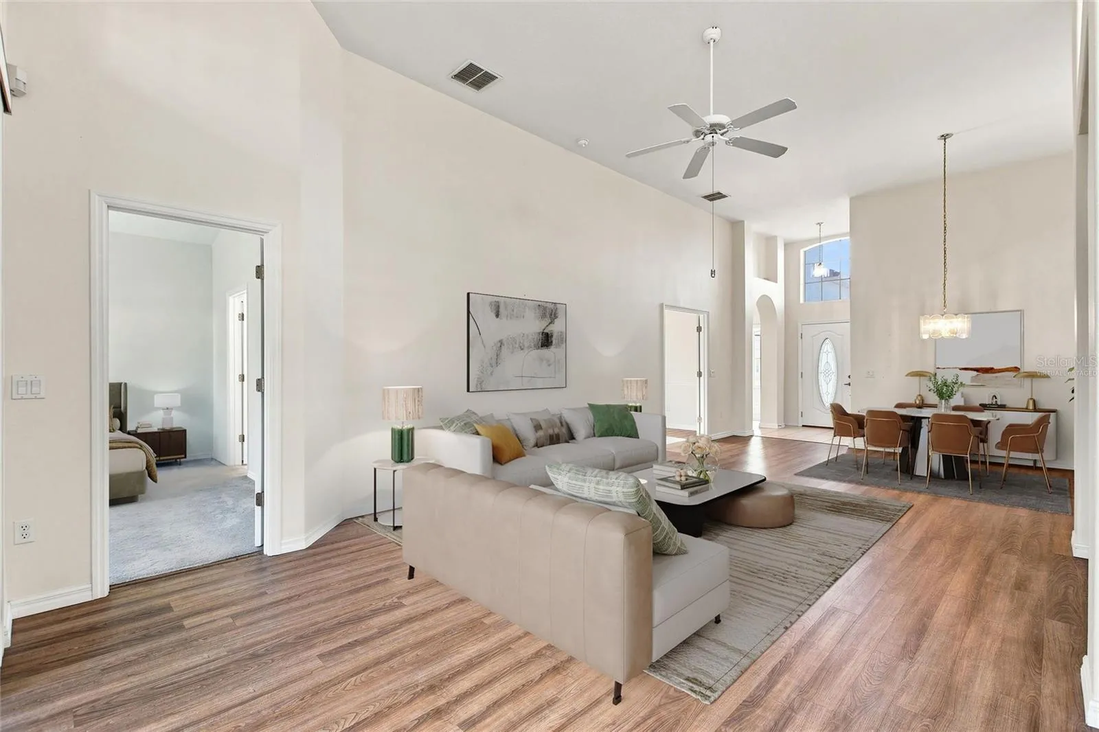 Virtually staged Great room and primary bedroom