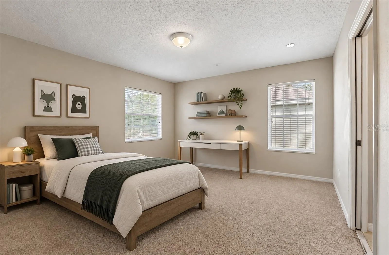 Second bedroom, en-suite access to a shared bath. Virtually Staged.