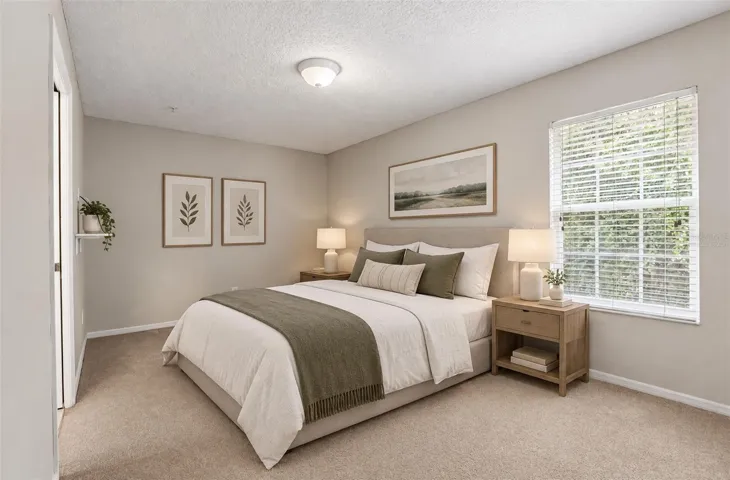 Third bedroom, en-suite access to a shared bath. Virtually Staged.