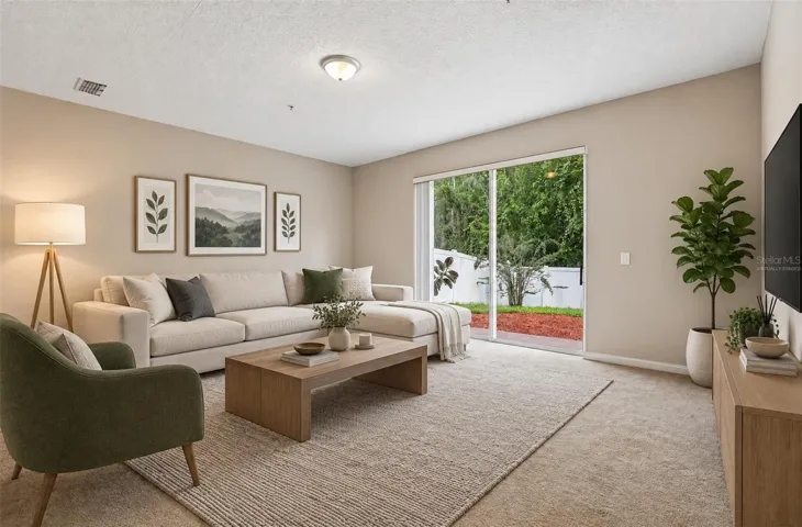 Family room off the kitchen. Virtually Staged.