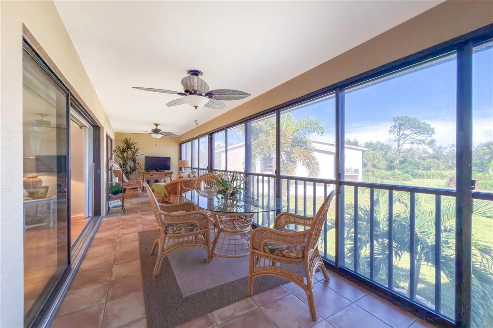 The vinyl enclosed and screened lanai provides an extra year round living area and has 2 ceiling fans.